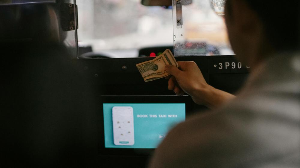 Uber brings cash payment option to more US cities but drivers are concerned