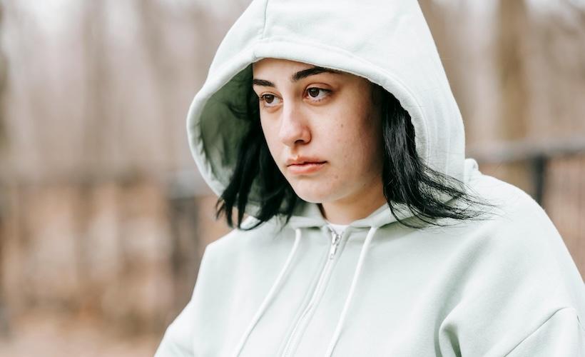 Gen Z Stare? Young Woman Looking Wistfully at House She’ll Never Be Able to Afford