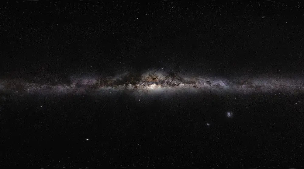Simulations find ghostly whirls of dark matter trailing galaxy arms