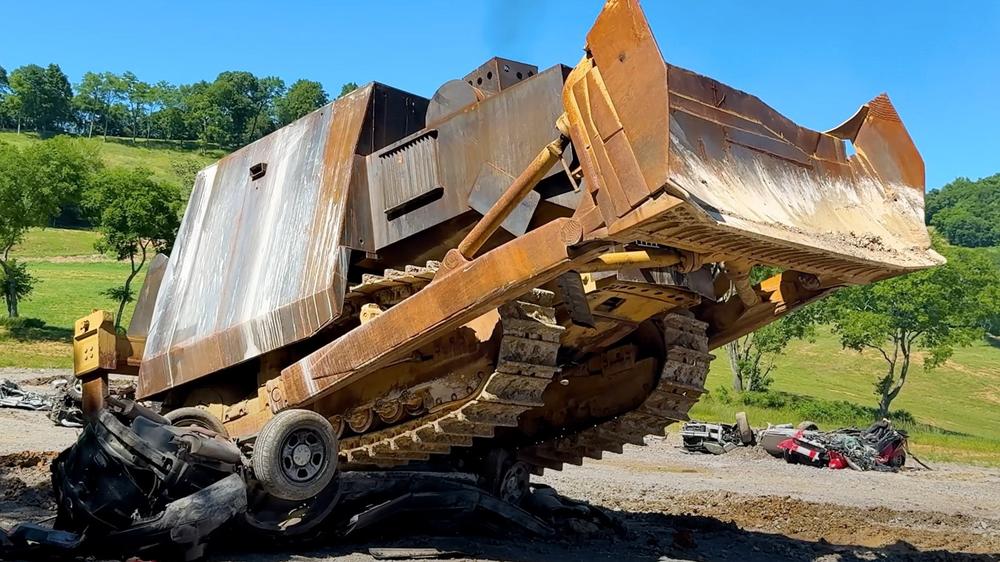 WhistlinDiesel builds replica Killdozer & offers to demolish buildings for people