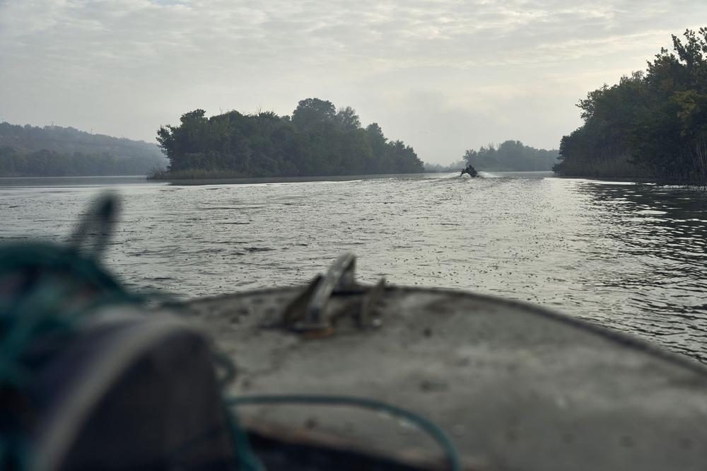 Russian forces regrouping near Dnipro River as they prepare for more active 'island war,' Ukrainian military officials say