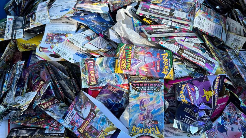 Dad caught teaching son to scam Pokemon fans with resealed packs