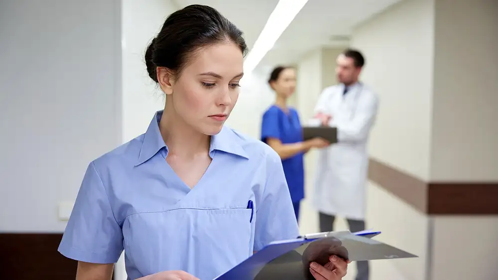 No-Nonsense Nurse Completes Entire Medical Chart After Pinching Arm Flab Once