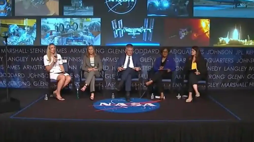 During a town hall Wednesday, NASA officials on stage looked like hostages