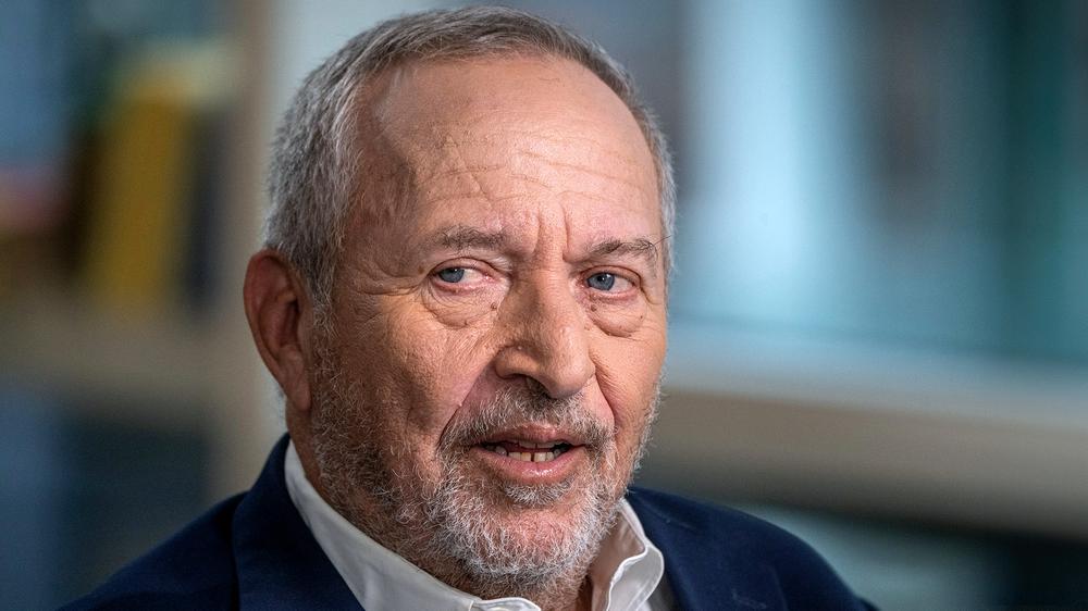 Larry Summers Announces He Will Step Down From Chair With Belt Around Neck