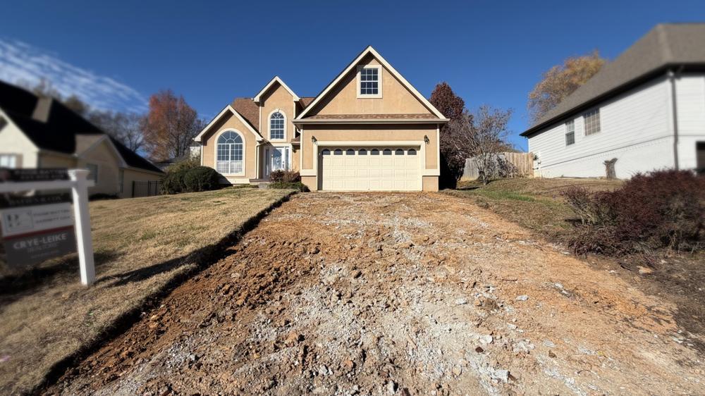 Woman’s driveway vanishes overnight in bizarre asphalt heist