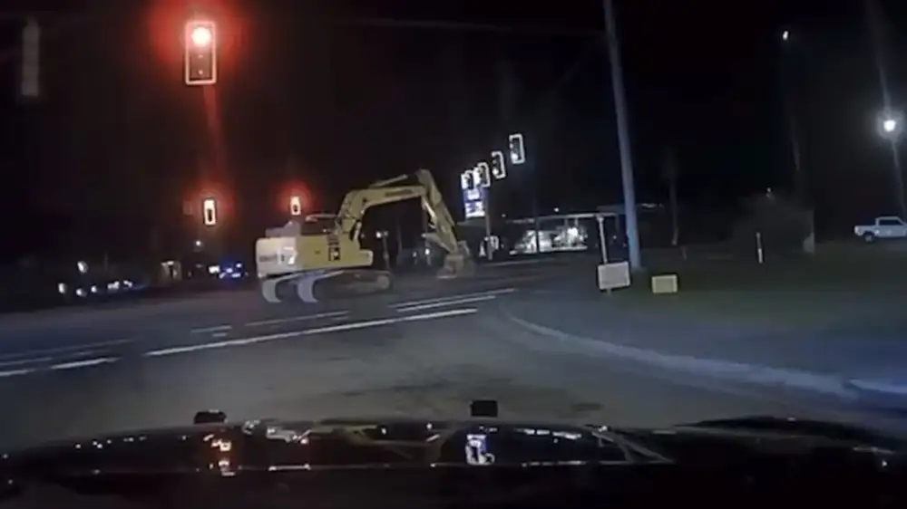 Dashcam video catches slowest police chase ever with excavator