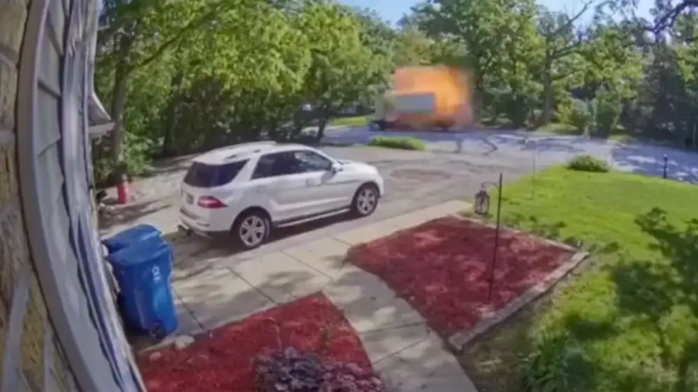 Box truck randomly explodes in viral video caught on doorbell camera