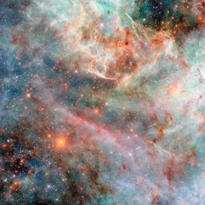 Grande Nube di Magellano catturata da Hubble: colori pastello tra sogno e realtà