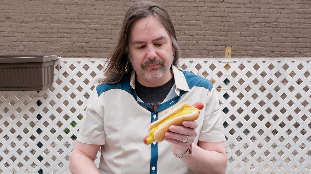 Frustrated Man Gets Mustard All Over His New Hot Dog