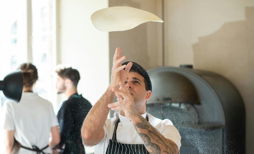 Self-Conscious Pizza Maker Can Only Playfully Toss Dough in Air When No One Looking