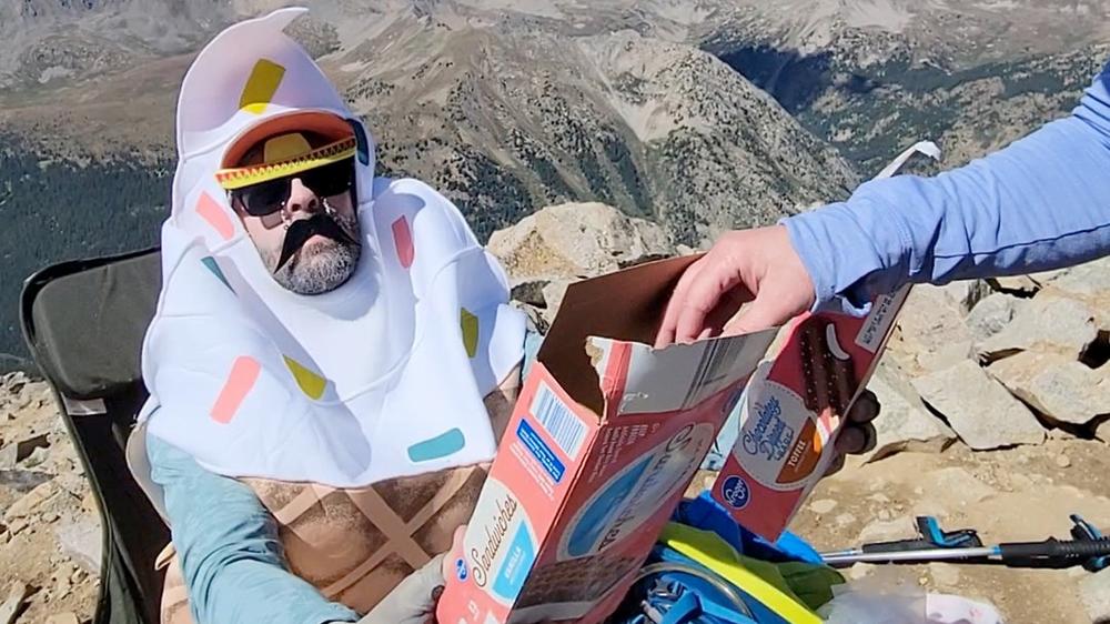 Hikers climb Colorado mountain to find “legend dairy” man giving out ice cream